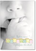 baby with finger in mouth