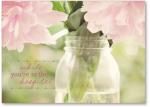 class jar with pink flowers