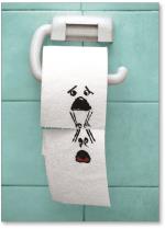 Toilet paper hanging on for dear life.