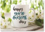 Mug and flowers on a blanket