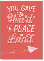 Paper airplane with heart