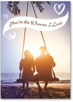 Couple on swing at beach