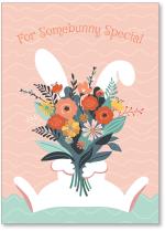 Bunny holding bouquet of flowers