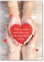 Hands holding cloth heart