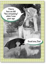 Retro dad showering son with hose