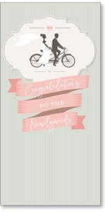Silhouette couple on bike