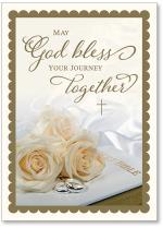 Roses and rings on bible