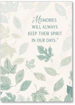 Green leaves on cream background