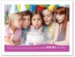 (PB) Girl blowing out candles