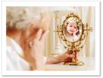 (PB) Old woman looking in mirror