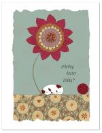 (PB) A dog sleeping below a large flower