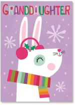 White bunny wearing scarf and earmuffs