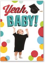 Baby tossing grad cap in air